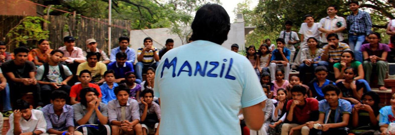 A gathering of young people at Manzil